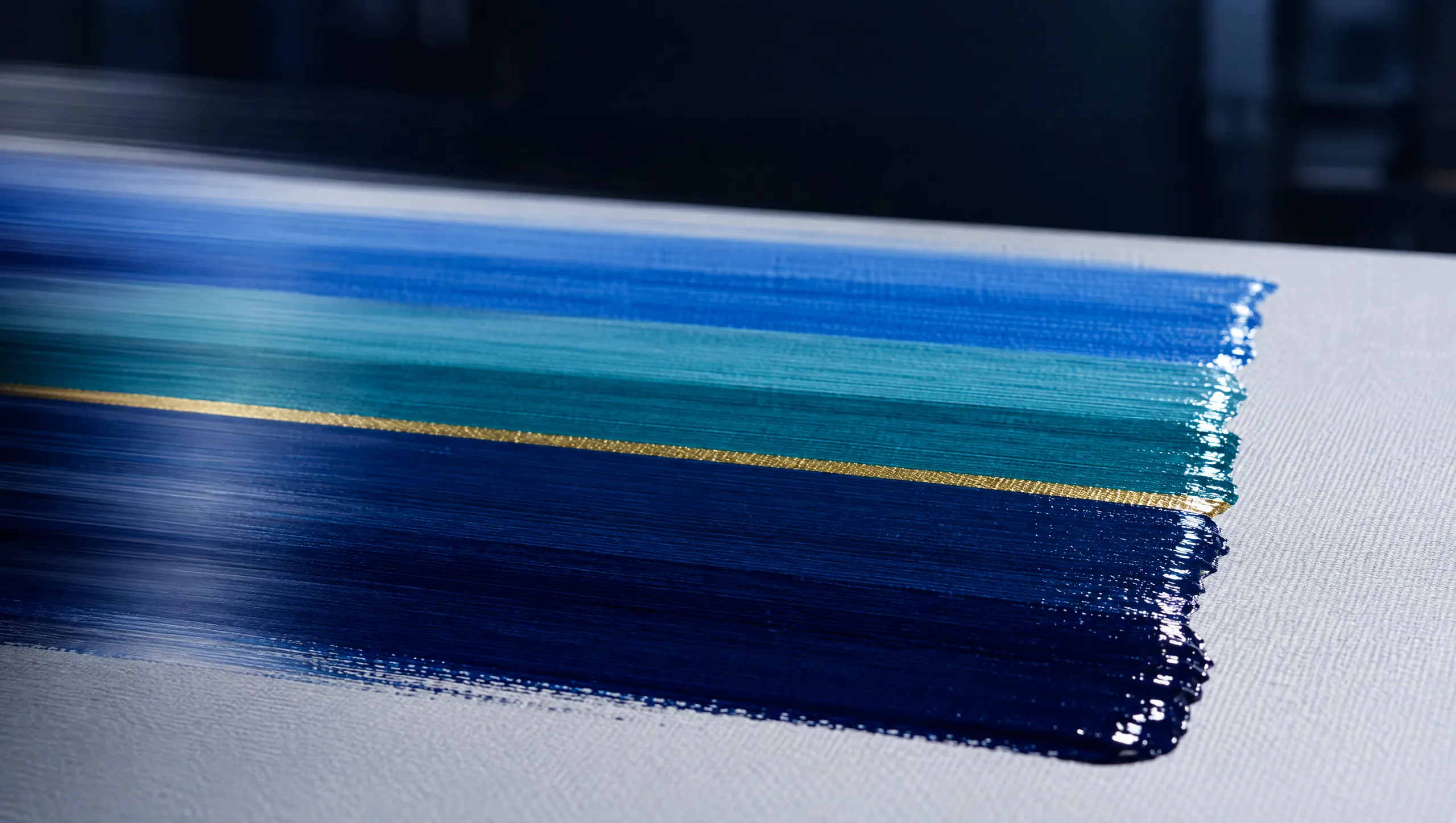 Fresh pigment laid onto canvas in navy, teal and blue bands with a thin gold line